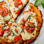 Craving pizza without the carbs? Master the perfect Easy Cauliflower Pizza Crust that's low-carb, delicious, and guilt-free. Learn how to transform veggies into a mouthwatering meal. Discover now!
