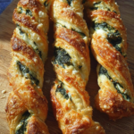 Craving a gourmet snack that's quick and delicious? Learn how to make crispy Parmesan and Spinach Cheese Twists that'll impress guests and satisfy your hunger. Try now!