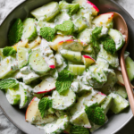 Cucumber Mint Yogurt Salad: Cool Refreshing Summer Delight! 5 Craving a cool summer salad? Elevate your picnic game with this easy Cucumber Mint Yogurt Salad that's crisp, creamy, and bursting with refreshing flavor. Discover now!