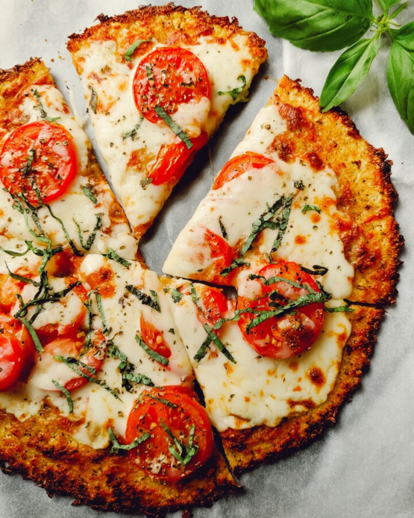 Craving pizza without the carbs? Master the perfect Easy Cauliflower Pizza Crust that's low-carb, delicious, and guilt-free. Learn how to transform veggies into a mouthwatering meal. Discover now!