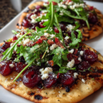 How to Make the Ultimate Roasted Cherry Flatbread with Goat Cheese 5 Craving a gourmet flatbread that combines sweet roasted cherries with tangy goat cheese? Learn how to create this stunning Roasted Cherry Flatbread with Goat Cheese, Thyme & Arugula in minutes. Try now!