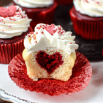 Bake easy hidden heart Valentine's Day cupcakes! Get tips for creating irresistible treats. Discover the secret to this cute and delicious dessert.