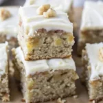 Delicious banana bread brownies with chocolate and banana on a wooden plate