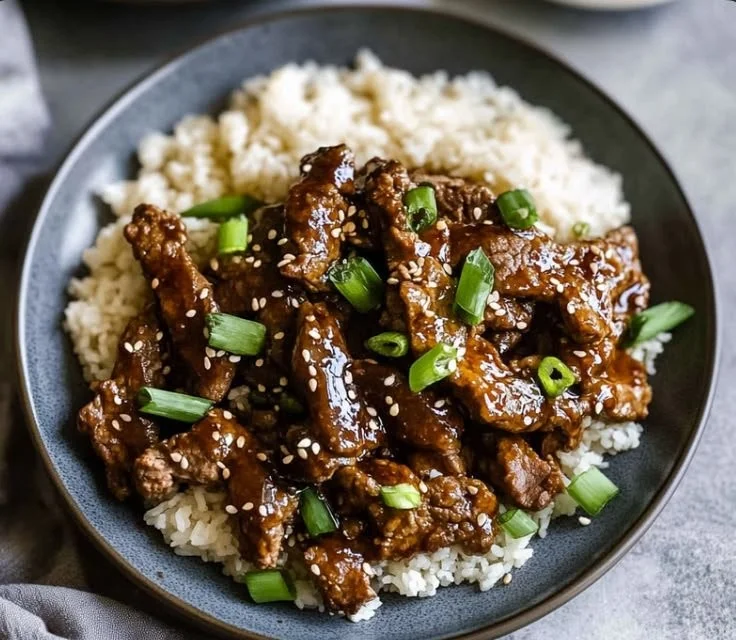 Mongolian Beef 3 Delicious plate of Mongolian Beef served with vegetables and rice