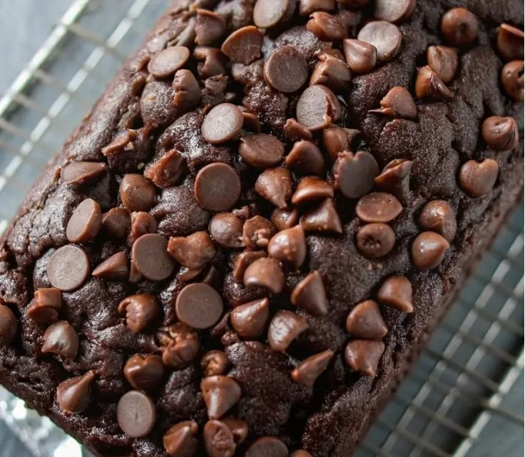 The Ultimate Chocolate Banana Bread 3 Delicious slice of ultimate chocolate banana bread topped with chocolate chips.