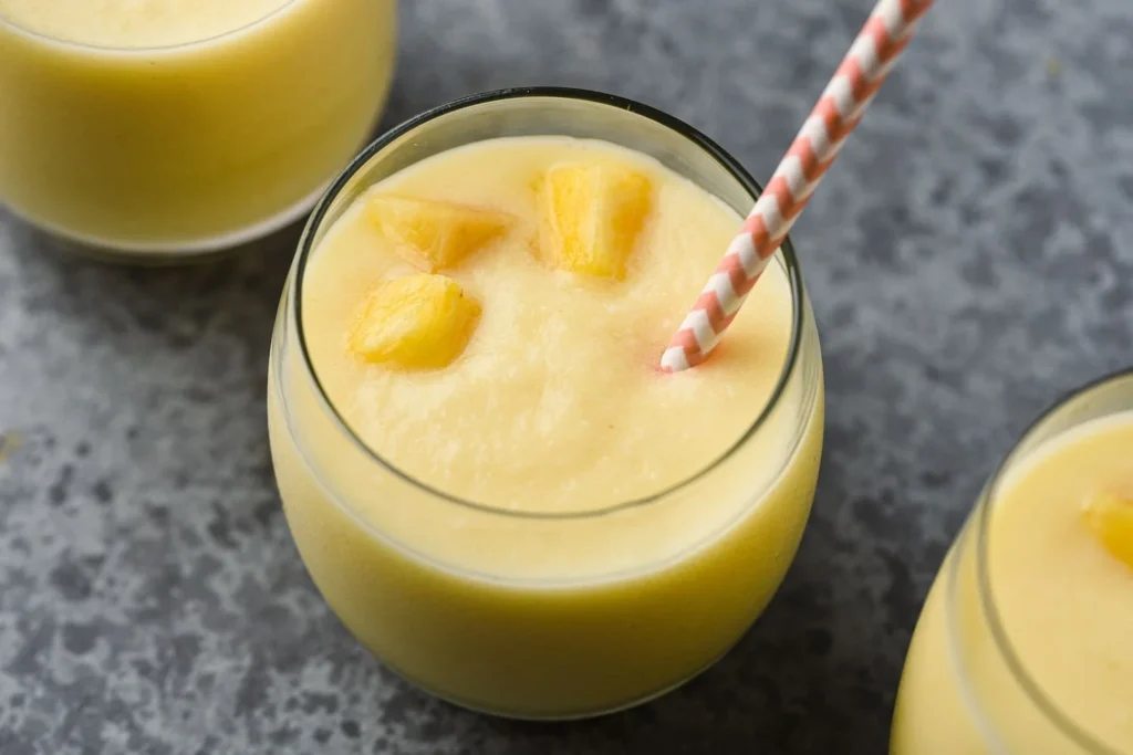 Delicious pineapple coconut smoothie in a tropical setting