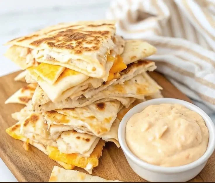Delicious easy chicken quesadillas filled with cheese and vegetables