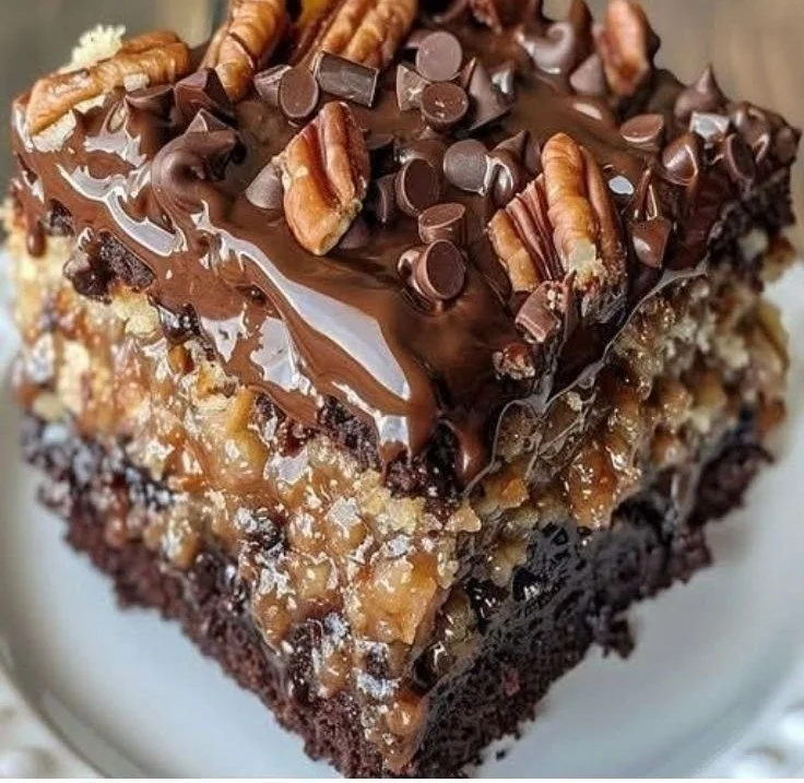 Delicious Easy German Chocolate Poke Cake with coconut pecan frosting