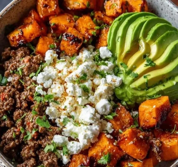 Delicious Ground Beef Hot Honey Bowl garnished with fresh herbs and spices