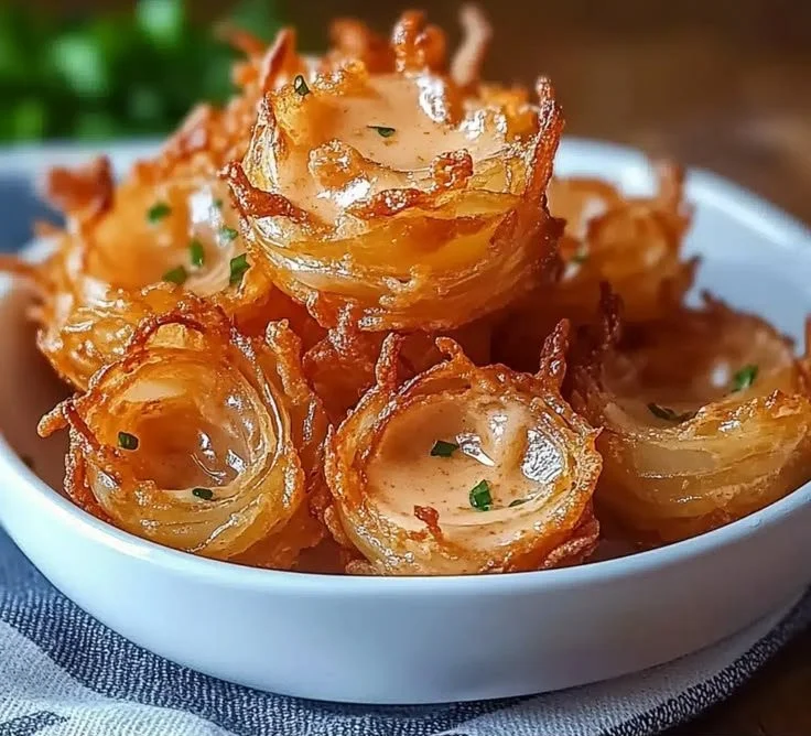 Guilt-Free Air Fryer Crispy Mini Blooming Onions ✨ 3 Guilt-free air fryer crispy mini blooming onions on a plate
