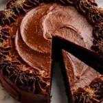 Layered Chocolate Espresso Guinness Cake topped with rich chocolate frosting