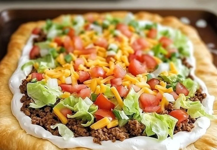 Taco Pizza Appetizer featuring colorful toppings and cheesy goodness