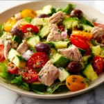 Delicious Mediterranean Tuna Salad with fresh vegetables and herbs