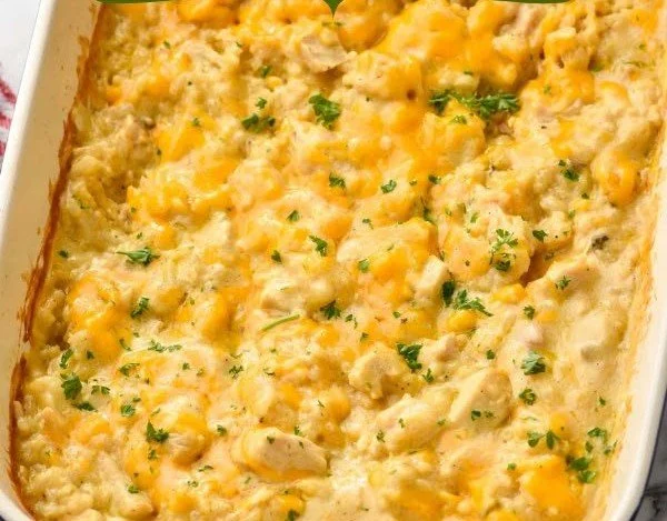 Oven-Baked Chicken and Rice Casserole 3 Oven-baked chicken and rice casserole ready to serve in a baking dish.