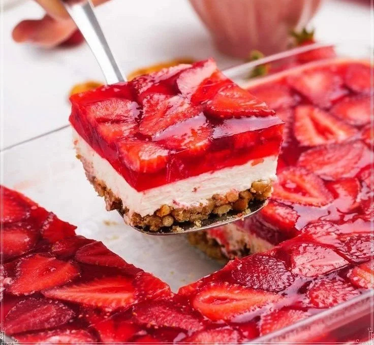 Strawberry Pretzel Salad 3 A colorful plate of Strawberry Pretzel Salad with fresh strawberries and pretzel crust.
